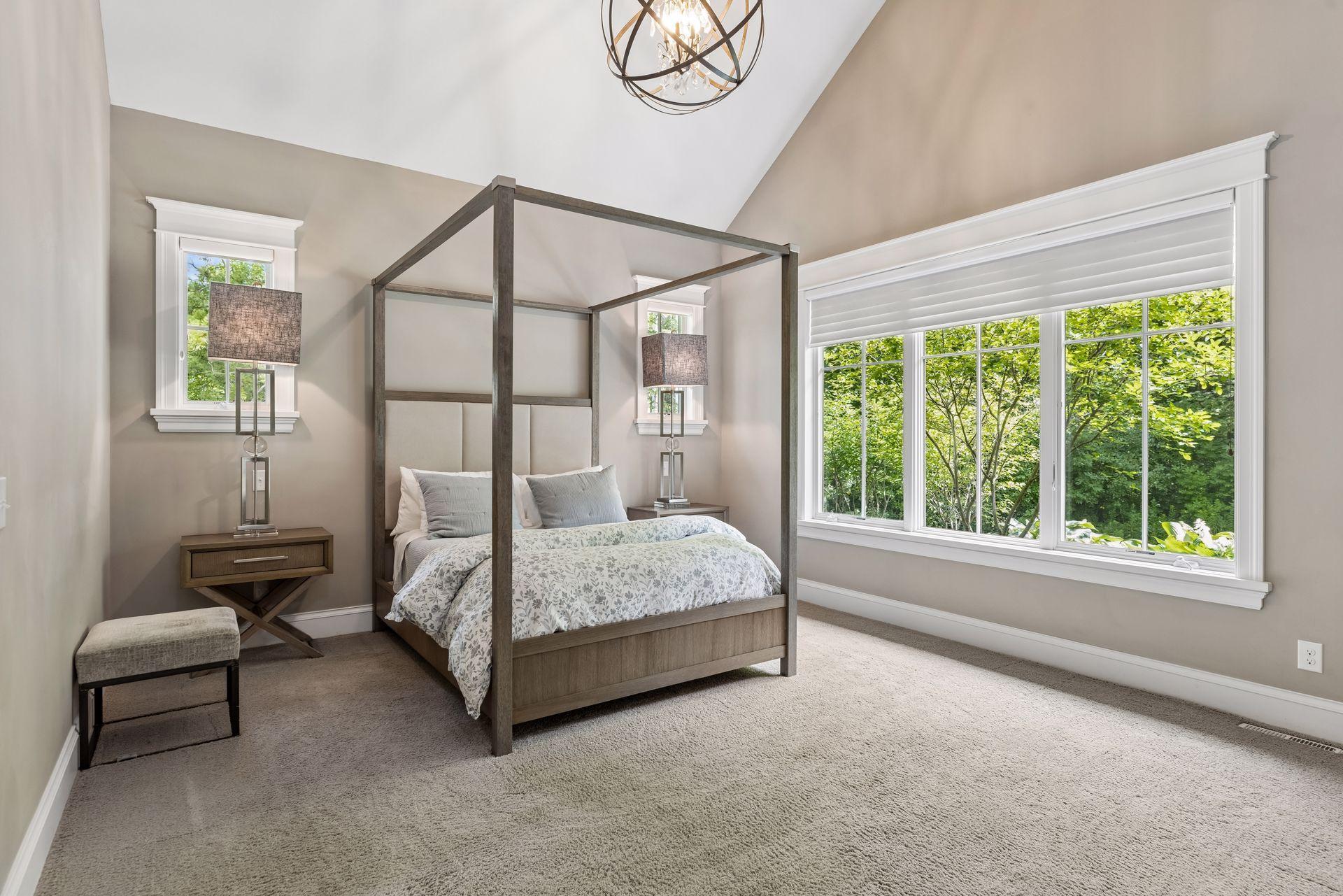 Primary Bedroom w/ Vaulted Ceilings - Main Floor