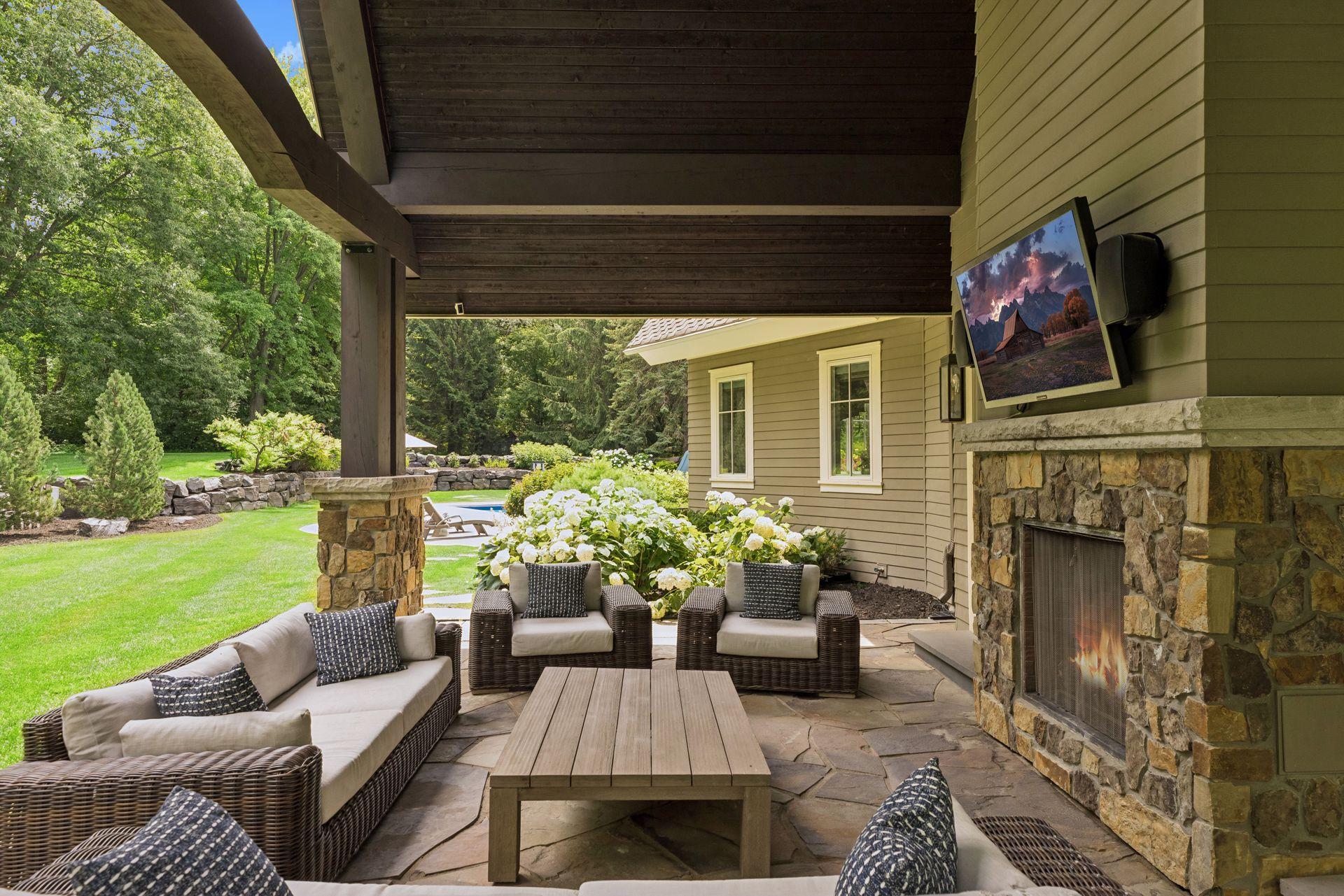 Covered Backyard Lounge Area w/ Fireplace