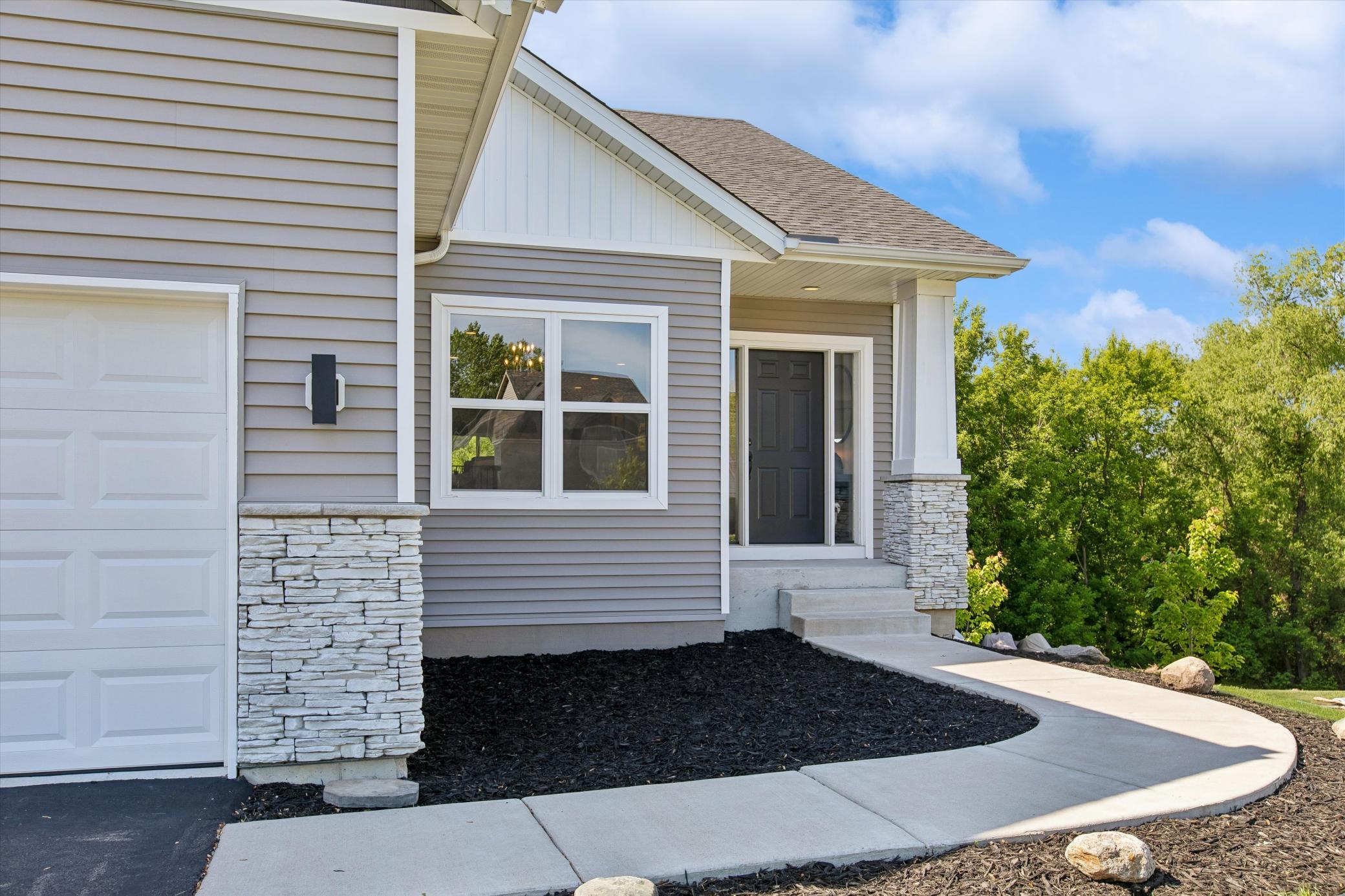 Clean, neat entryway - ready for your bushes and plants