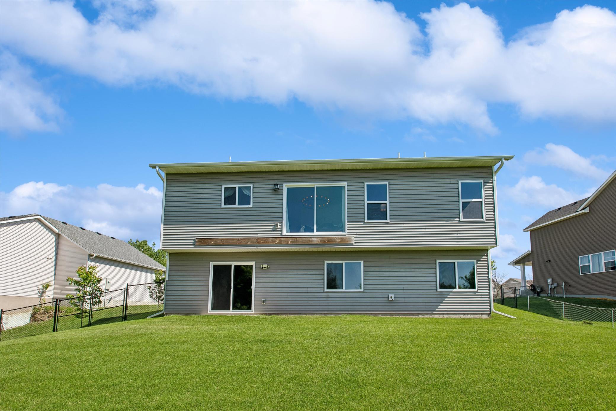 Spacious backyard for entertaining, playing, or creating a garden!