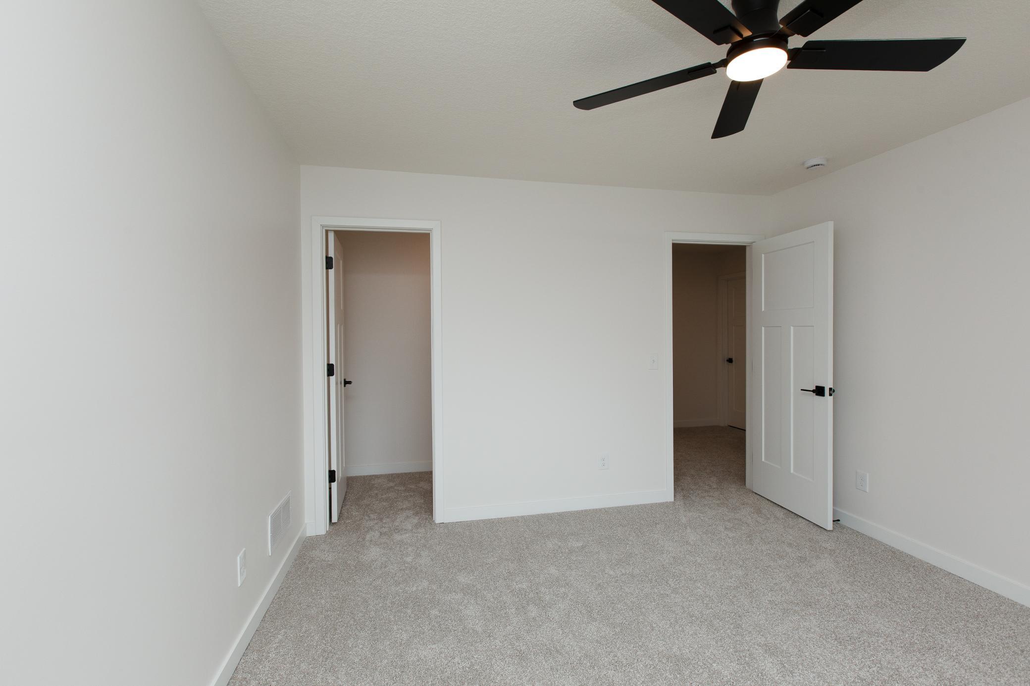 Great closets and ceiling fans in lower-level bedrooms