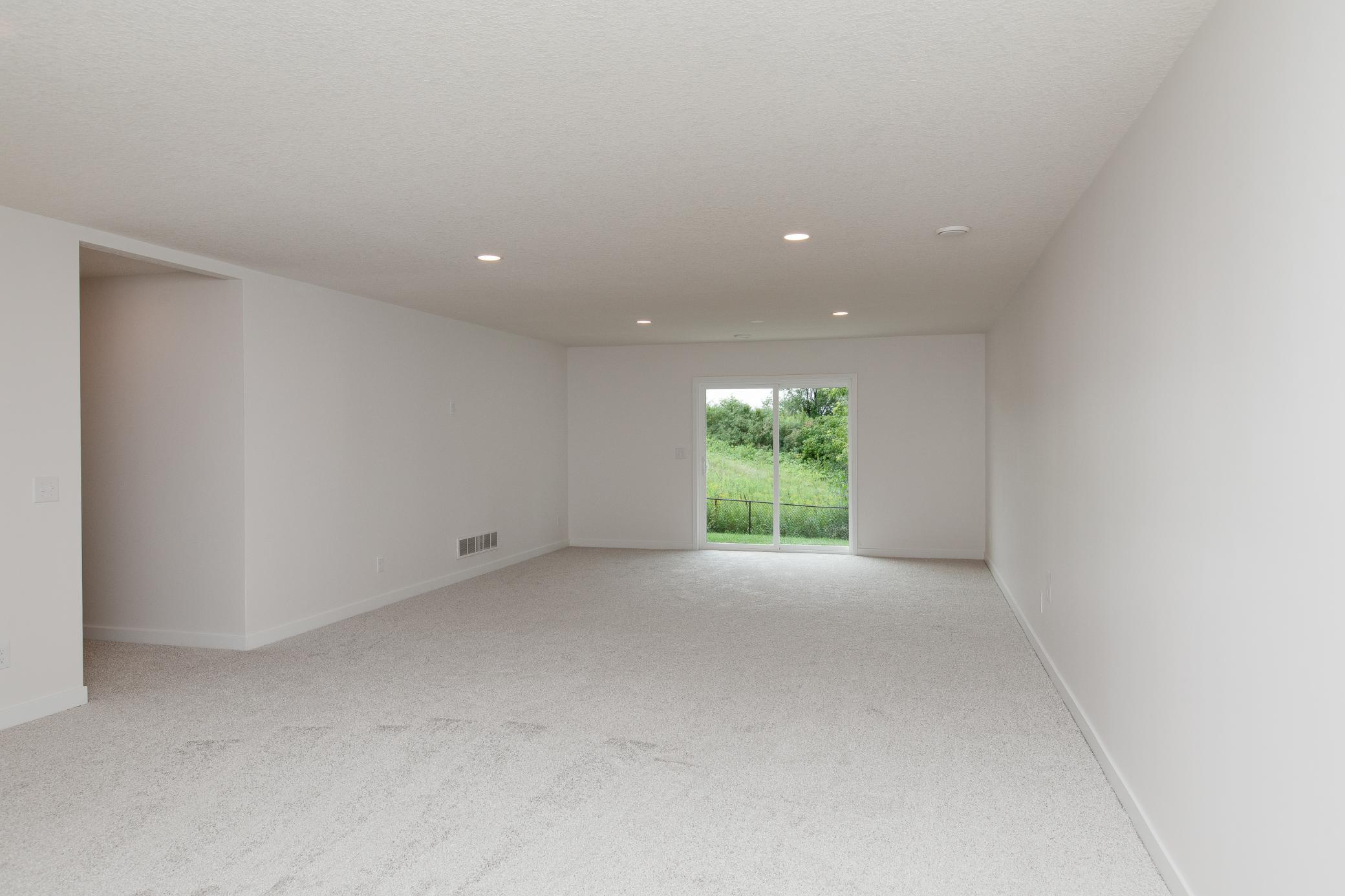 Generous rec room can accommodate all your furniture arrangements
