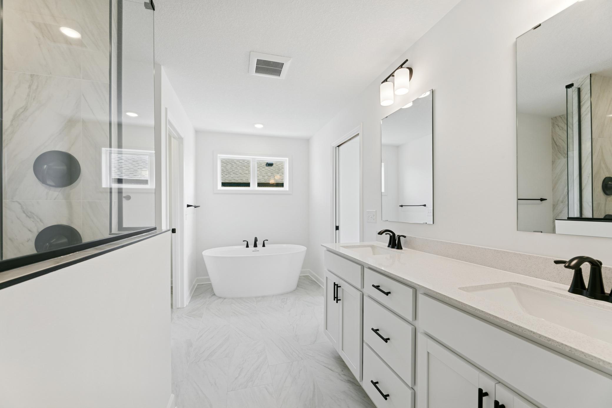 (Photo of a similar home, actual homes finishes will vary) Beautiful primary bath!