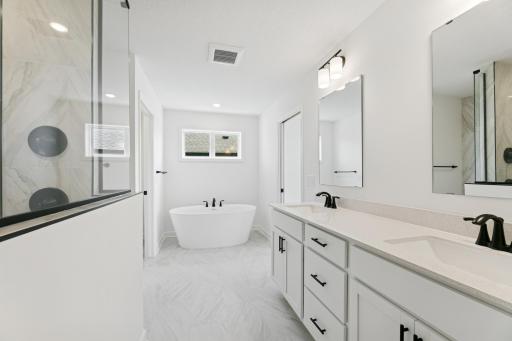 (Photo of a similar home, actual homes finishes will vary) Beautiful primary bath!