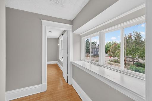 Upper-level landing connecting the surrounding bedrooms