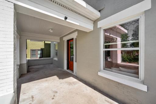 A spacious porch to sit back and enjoy the neighborhood