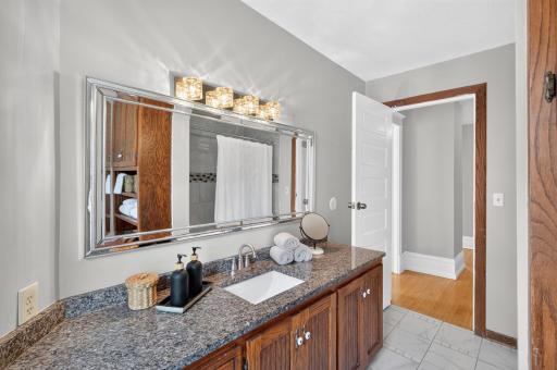 The upper-level full bath was thoughtfully remodeled in 2017