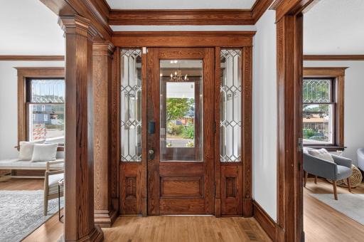 Original woodwork and leaded glass make a memorable first impression