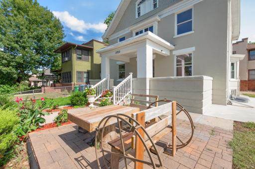 Inviting front patio and outdoor gathering space