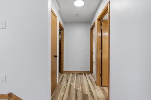 Hall to Main Level Bath, Bedroom, Utility Room and Huge Storage area