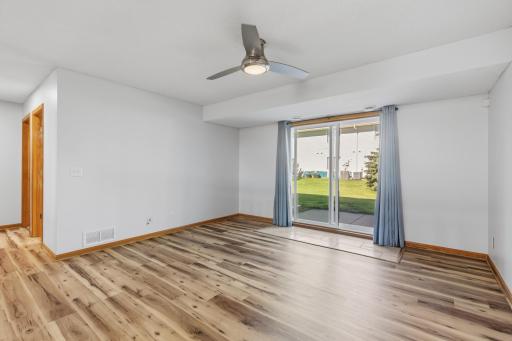 Large Living Room with Sliding Door to Cement Patio