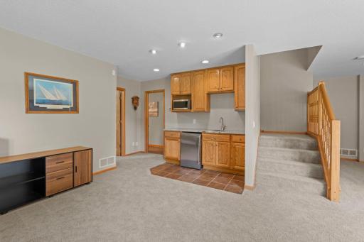 The wet bar could easily be converted to a kitchenette.