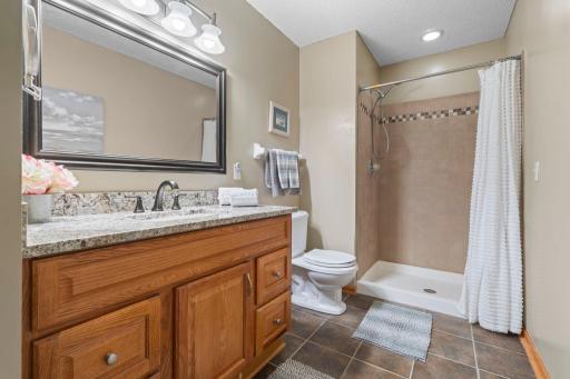 Lower level bathroom with in heat flooring.