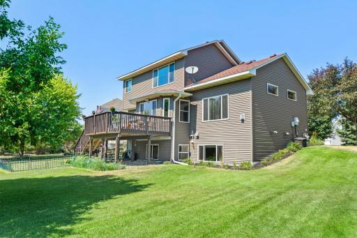 Step outside to your park-like backyard, spanning over half an acre, with mature landscaping, abundant green space, and exceptional privacy, perfect for relaxing or hosting family and friends.