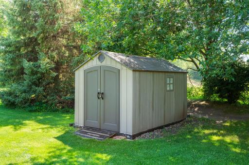 Complete with a shed for additional storage.