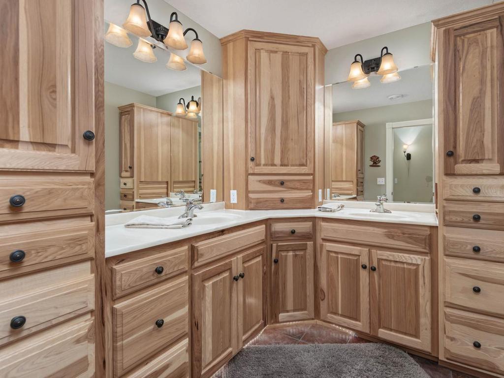 Second lower level Full Bath features striking dual sink vanity with loads of storage space!