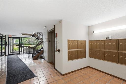 Mail is Located Next to The Elevator