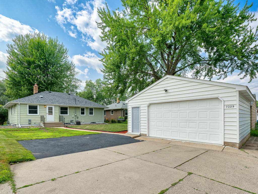 The oversized 2 car garage offers great storage and a freshly sealed garage pad.