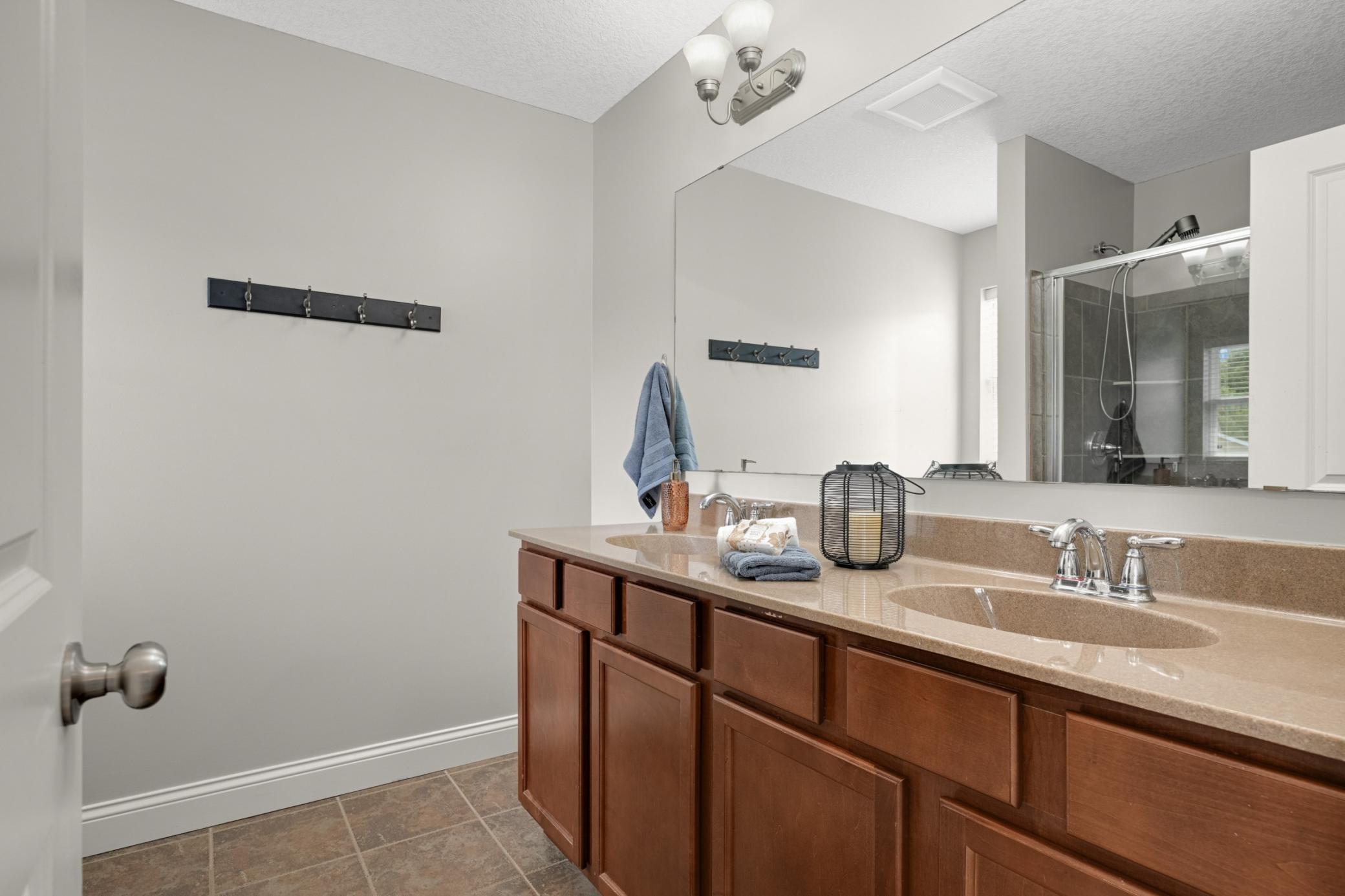 Primary bathroom, with double sink vanity.