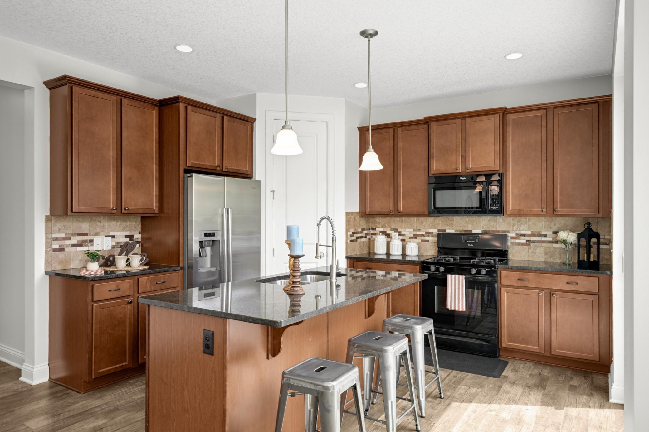 Large, open kitchen with a full pantry!