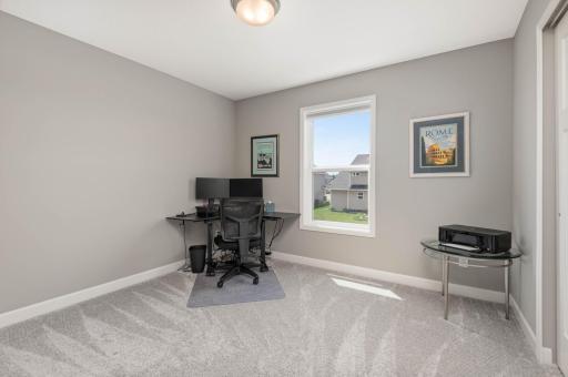 Bedroom 2 is used as a home office and has a wall closet. All the bedrooms have room darkening custom blinds.