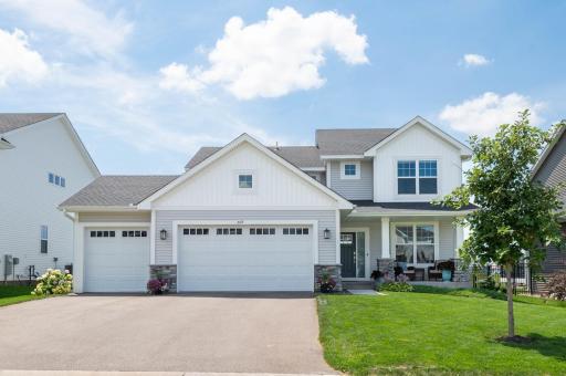 Outstanding two story awaits your family! Great curb appeal with stone accents, insulated garage doors with windows and front porch. Welcome home!