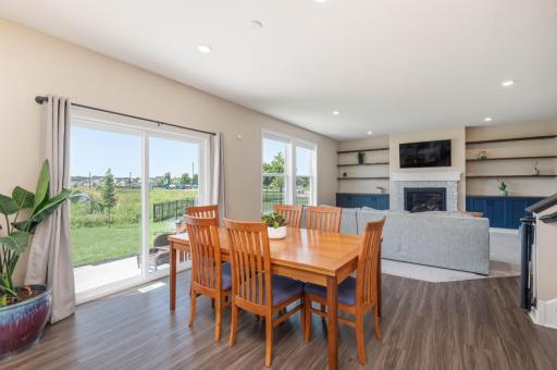 The large dining area steps out to the 25 x 12 patio and the level back yard. Quality fresh paint throughout the main floor and neutral LVP for easy living.
