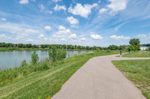 Stay healthy with paved trails! Schools, Target, groceries, dining, the theater and Lake Waconia are roughly a mile away!