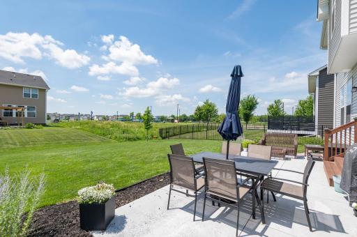 This patio is so much easier than maintaining a deck and it is level with the yard for kids and guests to enjoy the lawn!