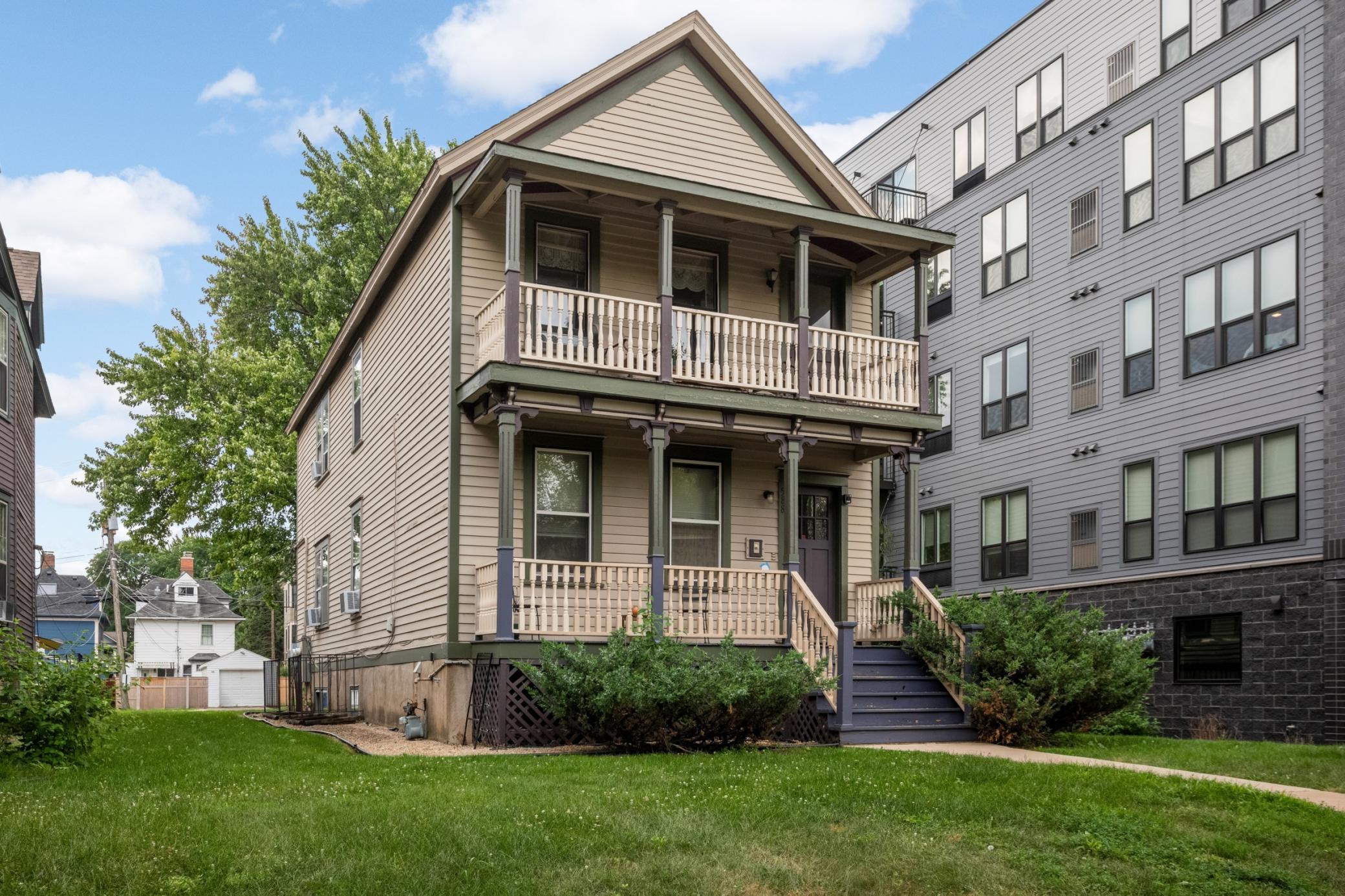 Welcome to a Historic Victorian Triplex with Modern Infrastructure & Timeless Character