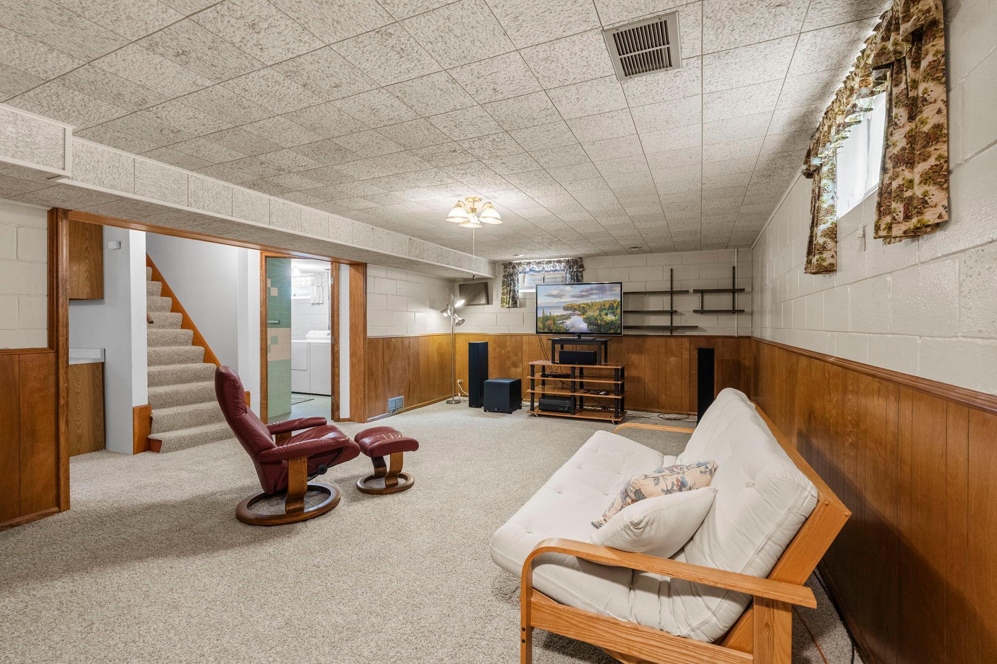Downstairs, the home offers even more versatile living space.