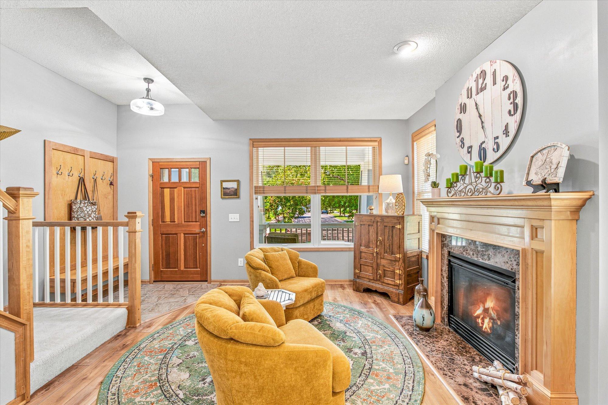 Tall ceilings and numerous windows create a bright and airy space.