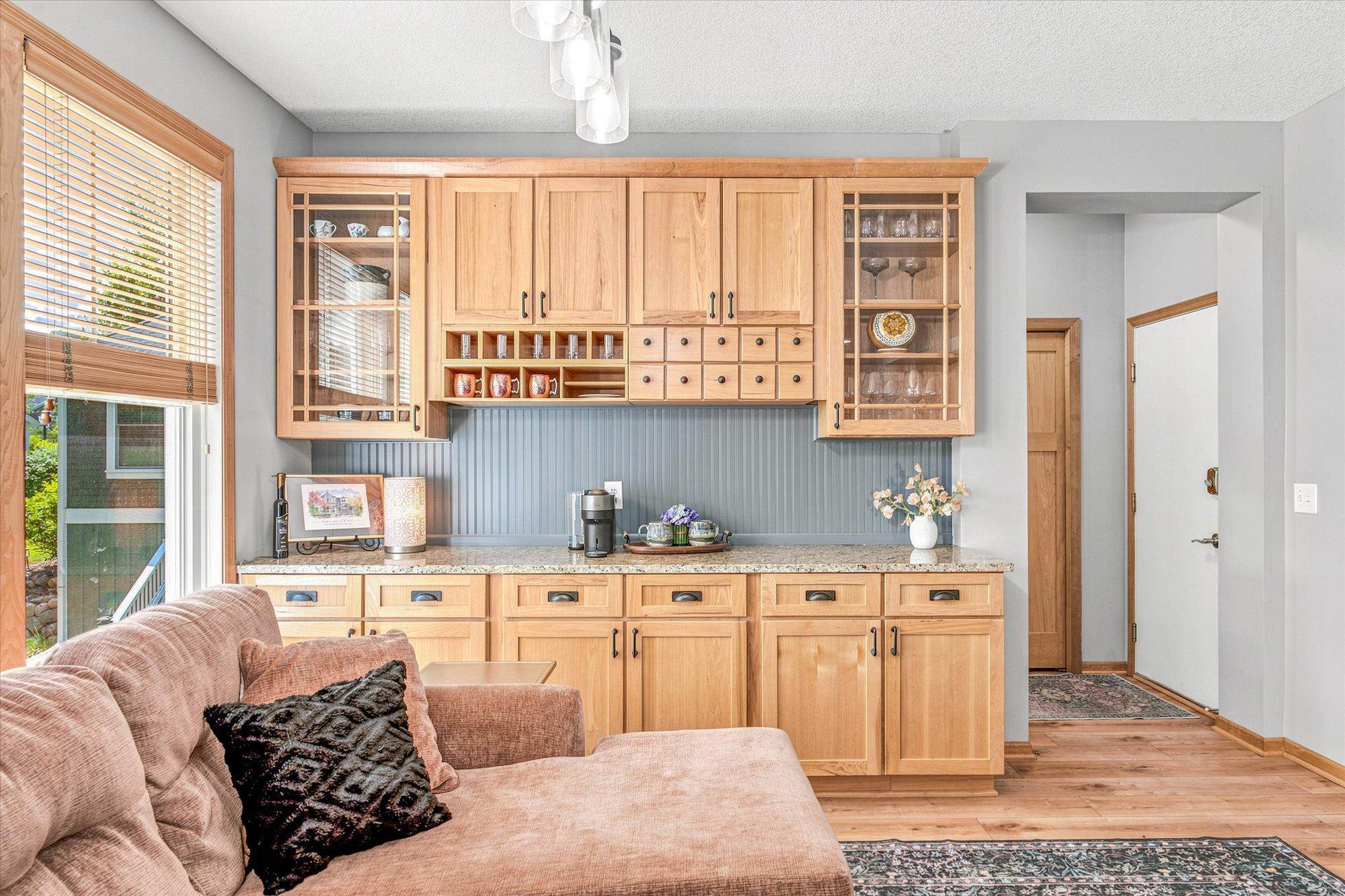 Lovely built-ins provide ample storage and extra counter space.