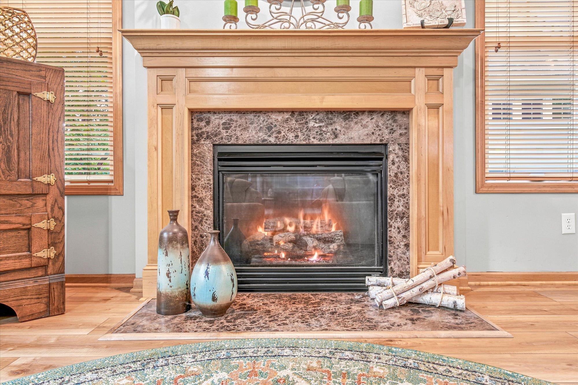 The lovely gas fireplace creates a lovely focal point.