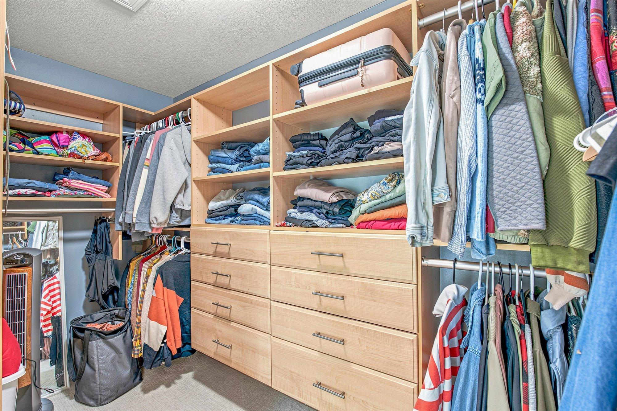 A custom closet system will keep your clothing organized!