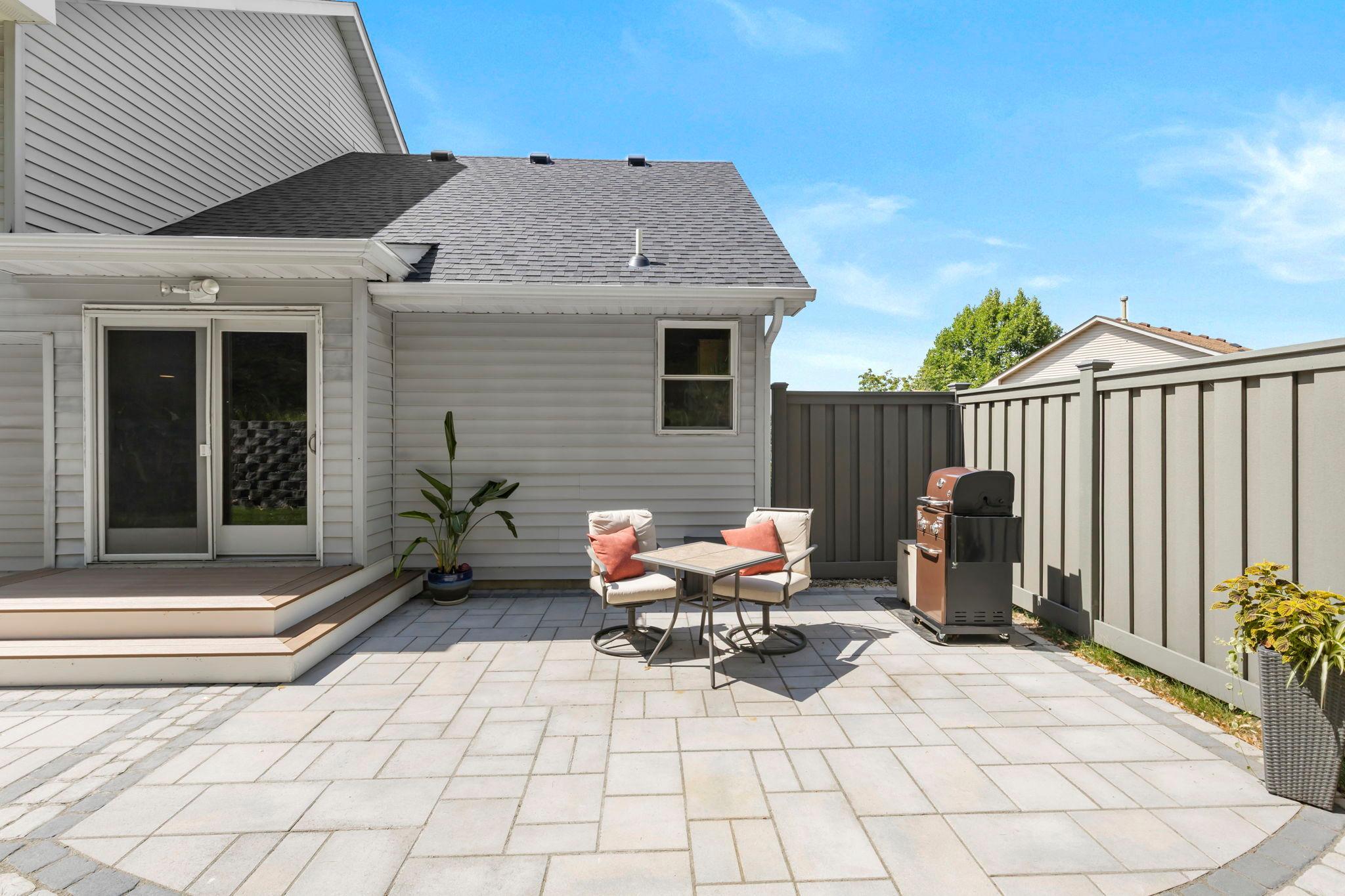 The brand-new patio and deck (2025) provide plenty of room to grill, entertain, or simply enjoy a quiet evening outdoors, while the partial privacy fence adds another layer of comfort.
