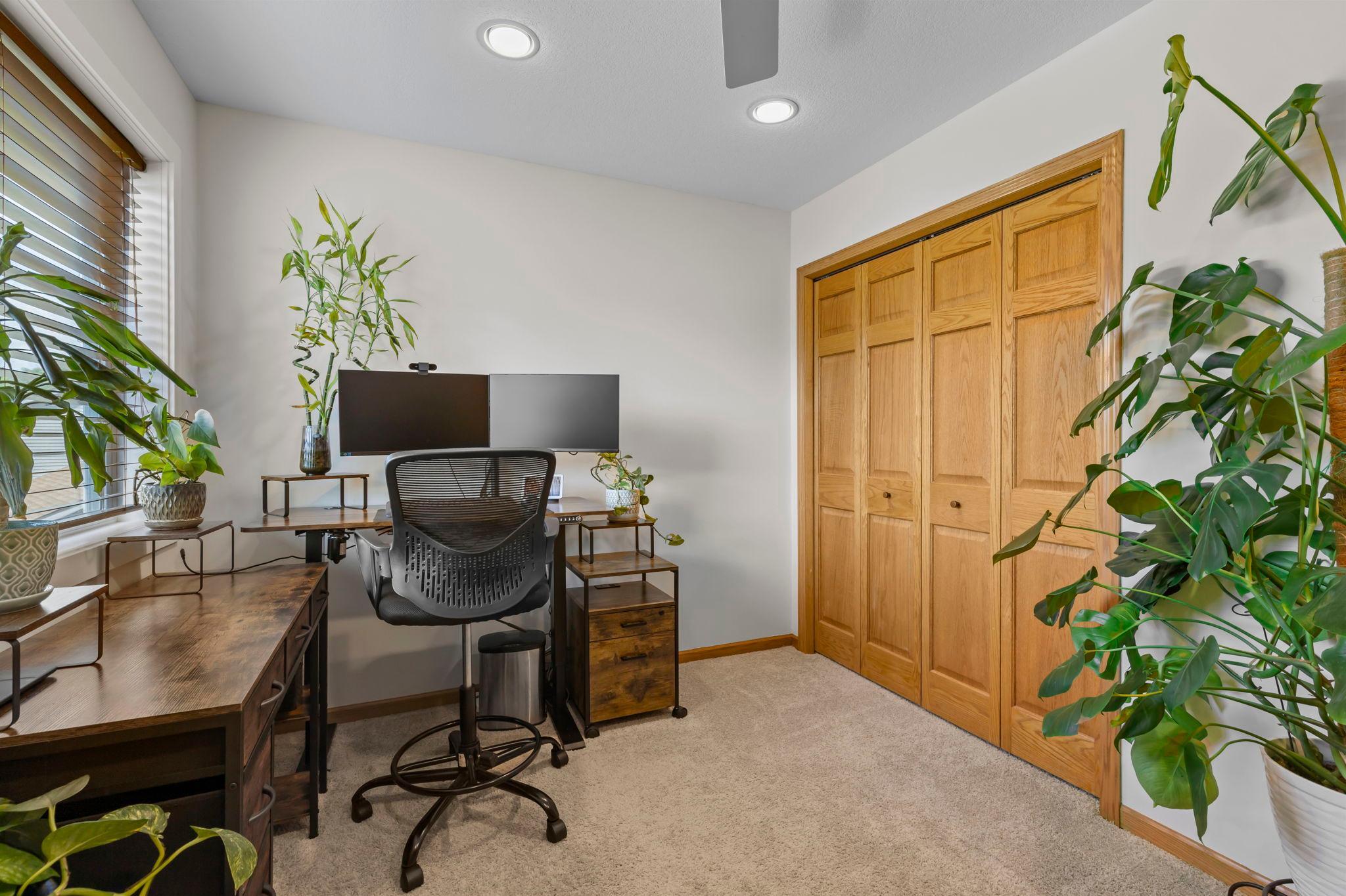 Both bedrooms with ceiling fans and comfortable carpeting.