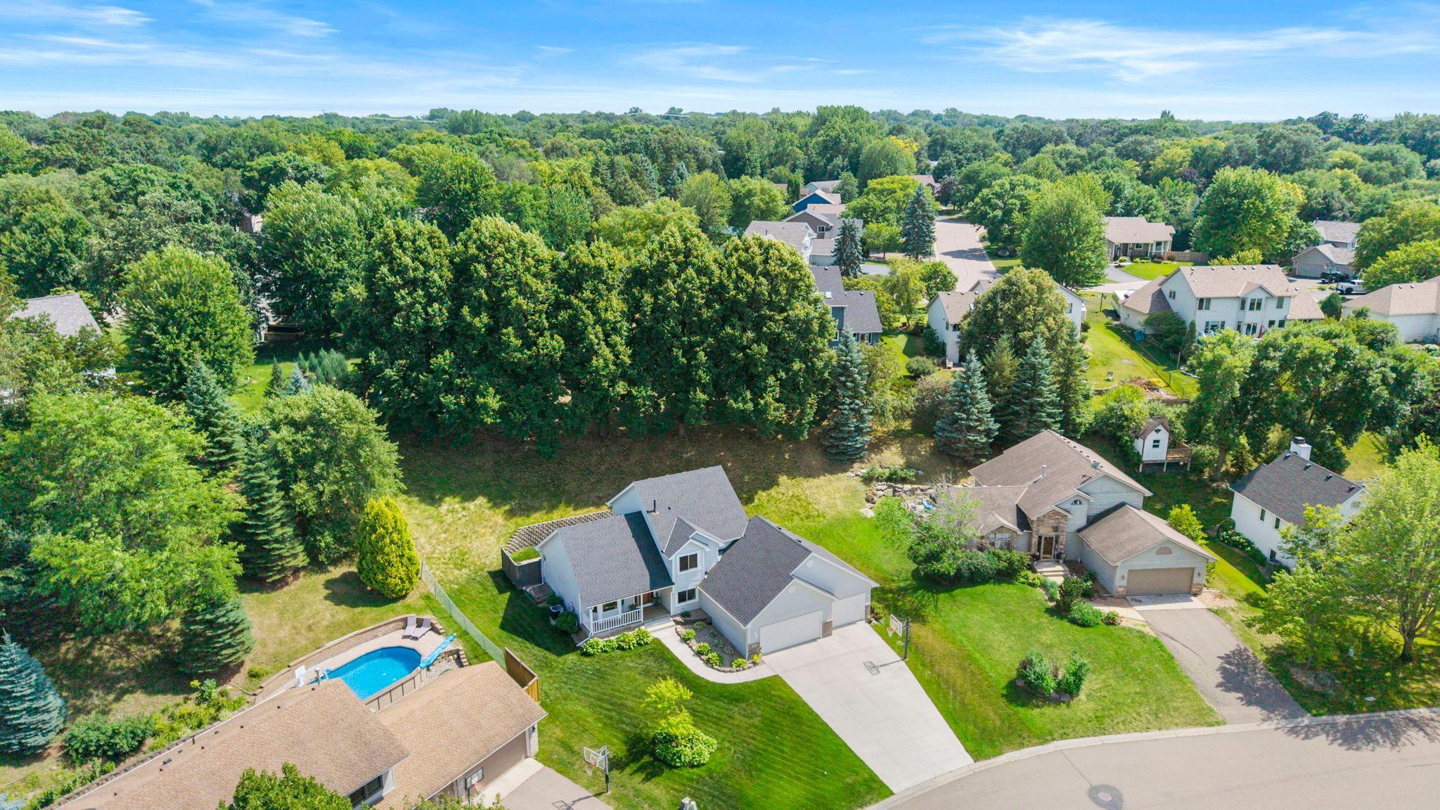 The heated, insulated, and finished three-car garage offers more than just parking. It's an ideal space for storage, hobbies, projects, or keeping vehicles protected through every Minnesota season.