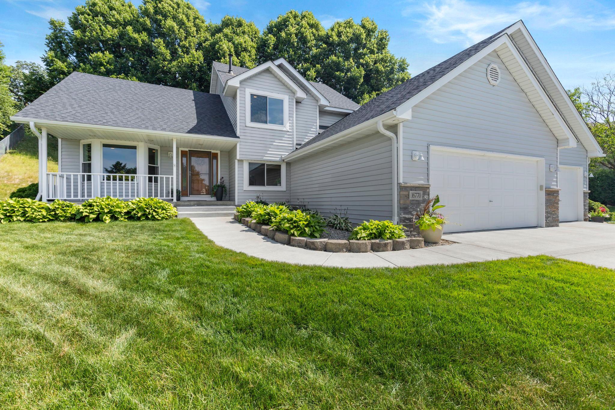 Garage insulation and drywall (2026), outdoor freeze-protection spigots, water-efficient showerheads, updated LED lighting throughout. The prepaid lawn treatment service continues through the end of the year.
