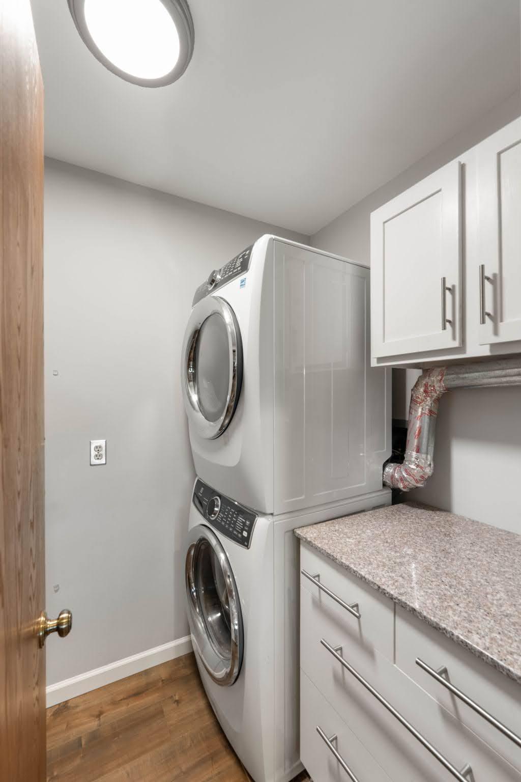 Laundry room with full size washer and dryer