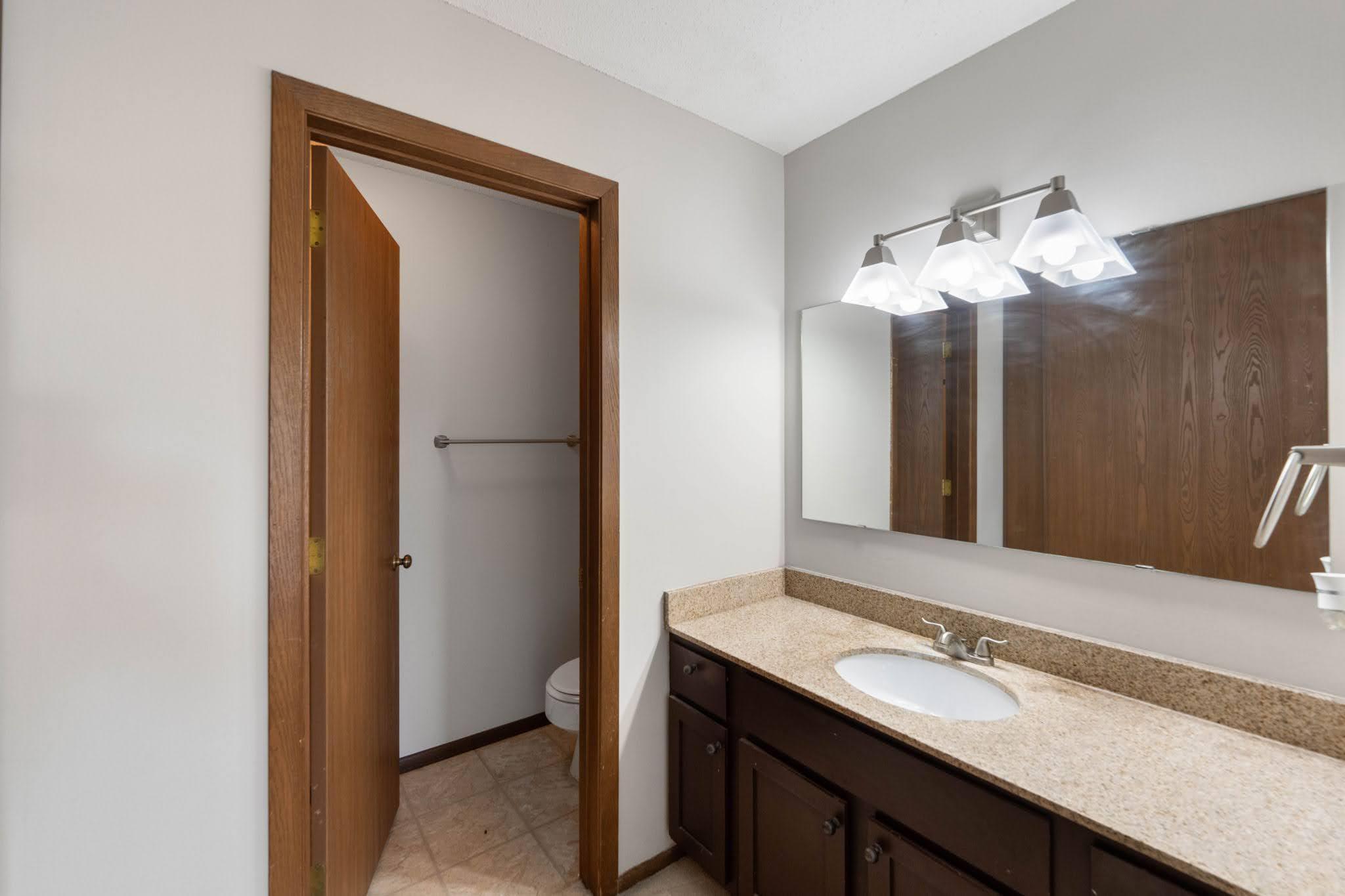 Main bathroom has separate water closet for privacy