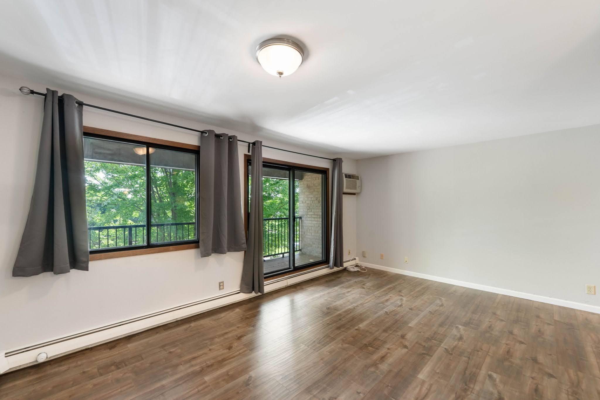 Spacious living area walks out to covered deck