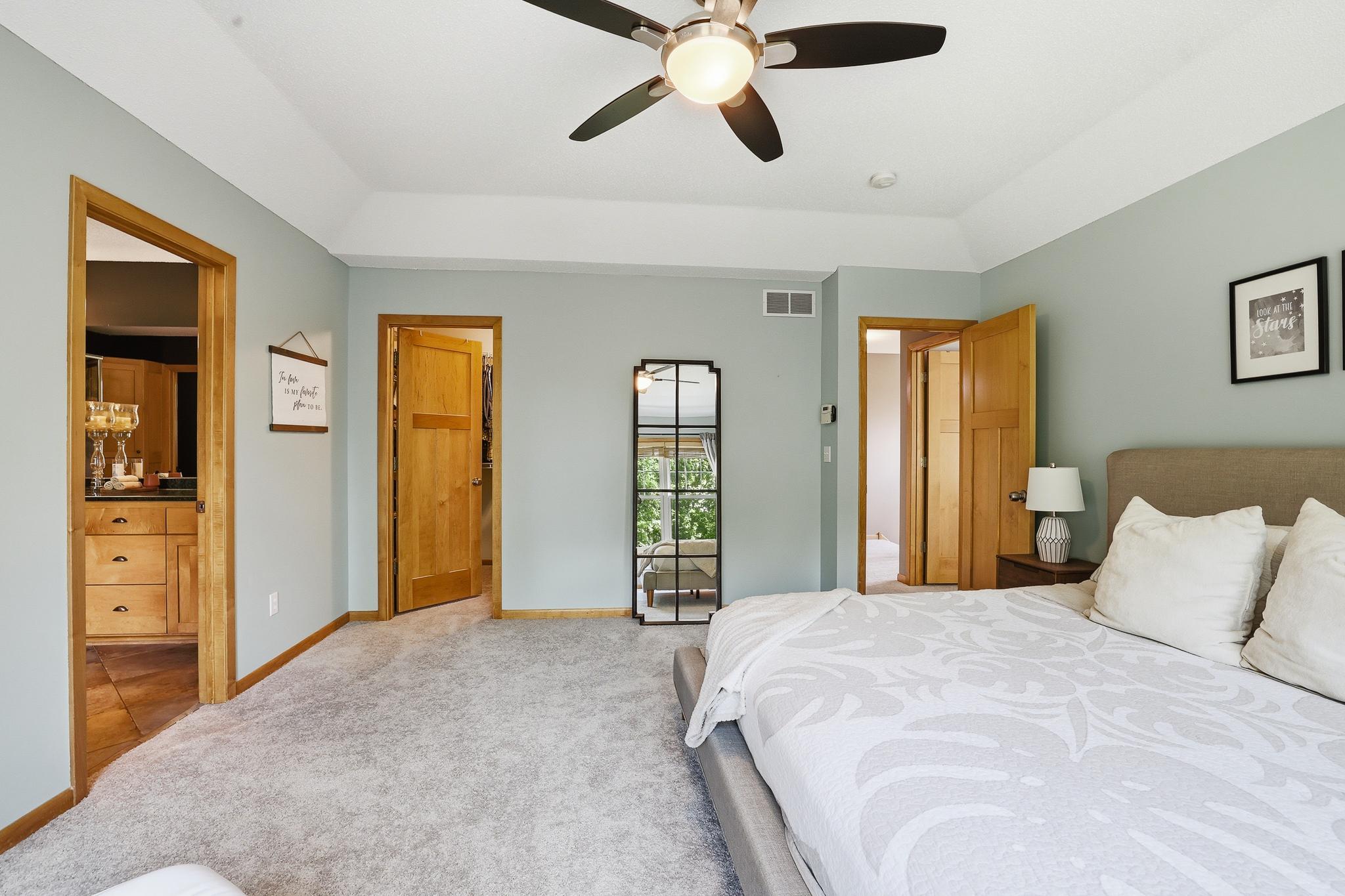 Primary bedroom offers walk in closet and bathroom suite.