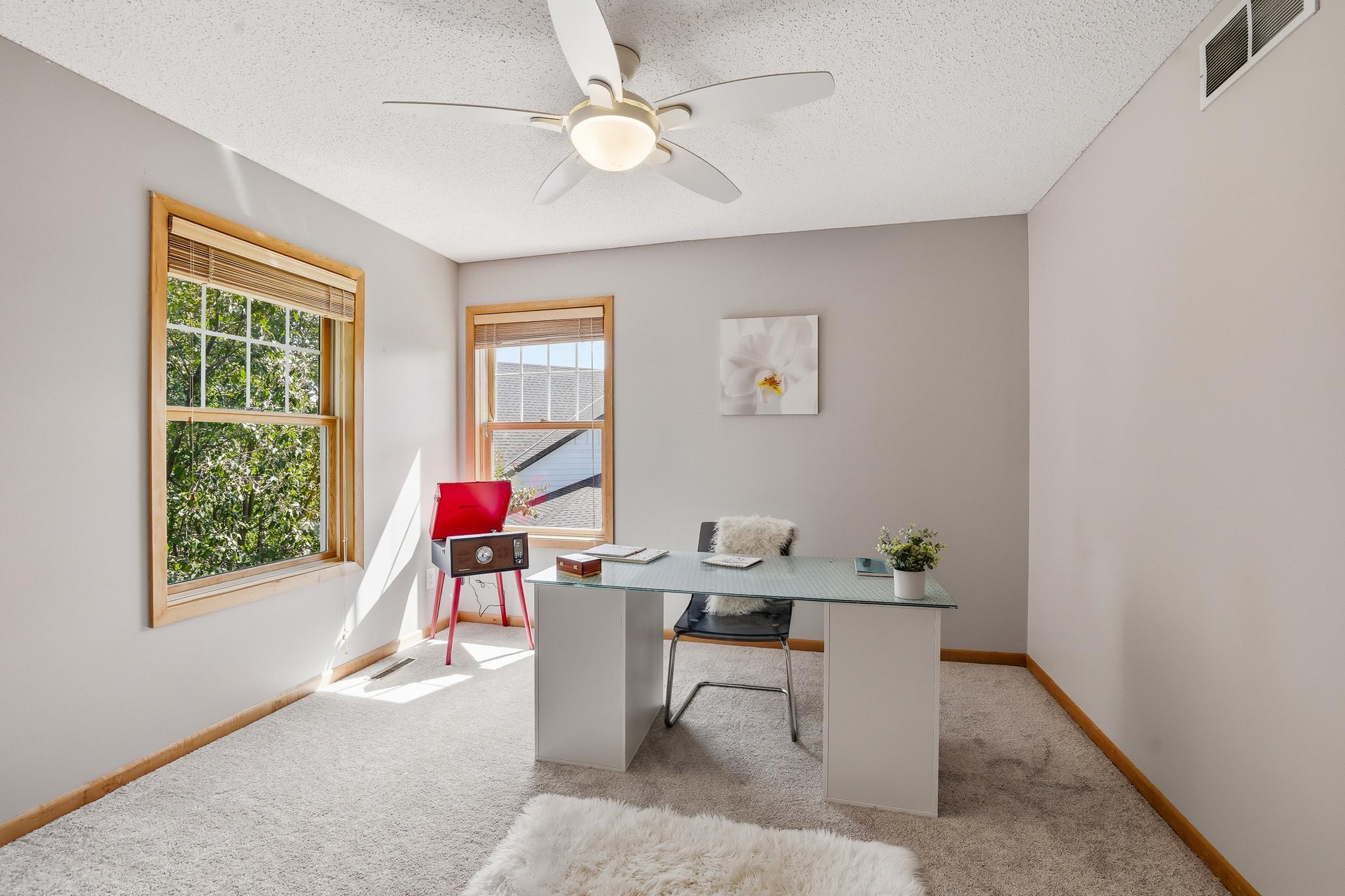 Additional upstairs bedroom being used as a second office.