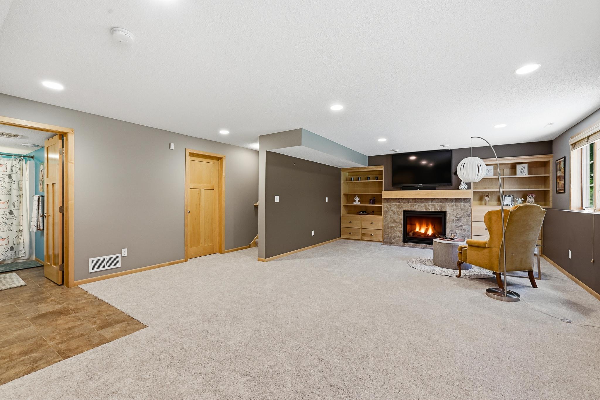 Downstairs is finished and offers an excellent fireplace and entertainment space!