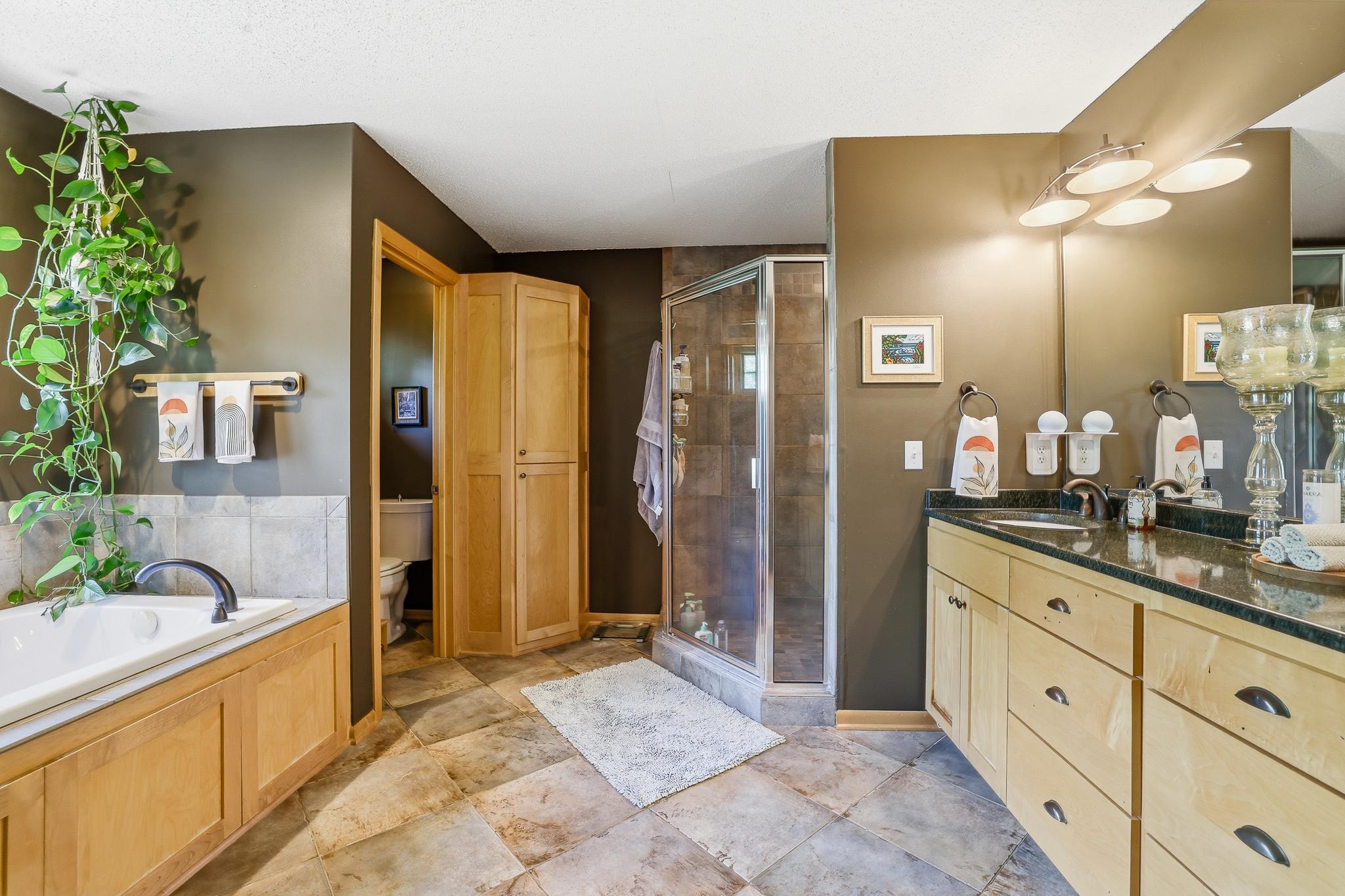 Full bathroom and large vanity.