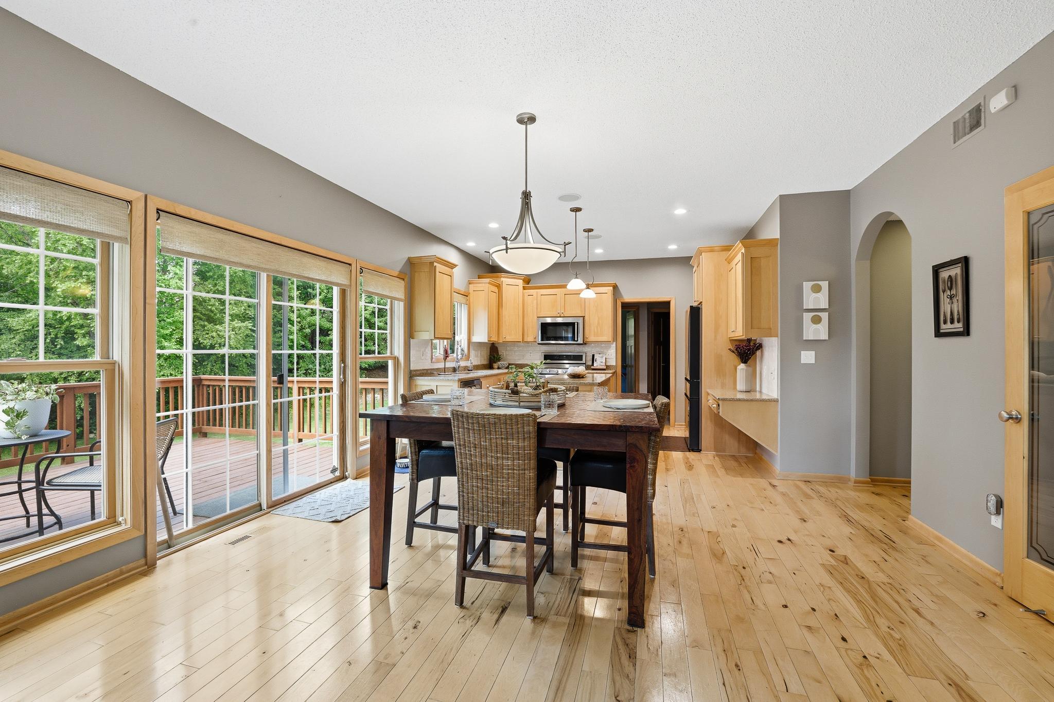 Steps from the kitchen is the large deck offering great views of the beautiful backyard.