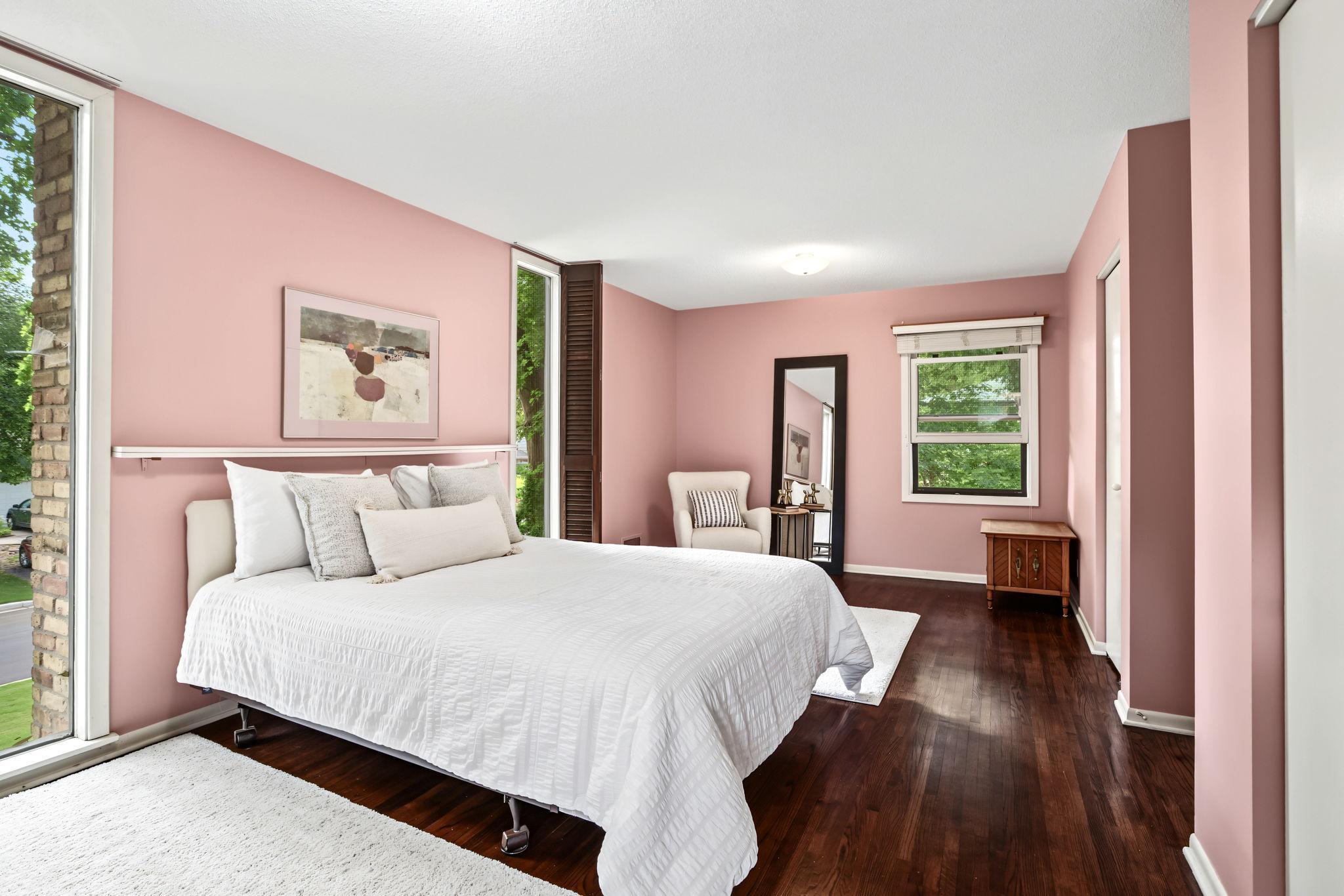 Primary bedroom has so much space with two closets and a full ensuite bathroom.