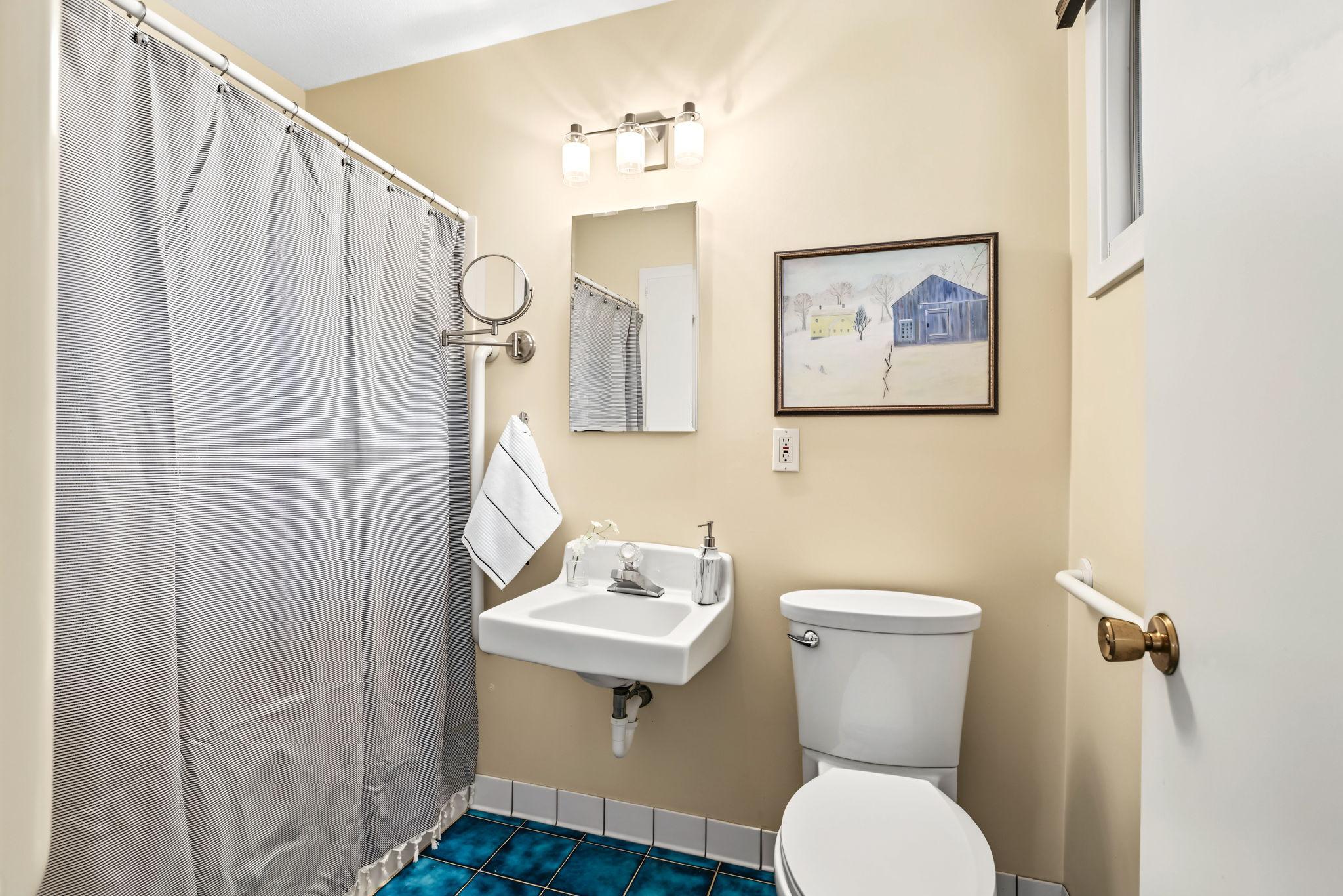 Full bathroom off primary bedroom.