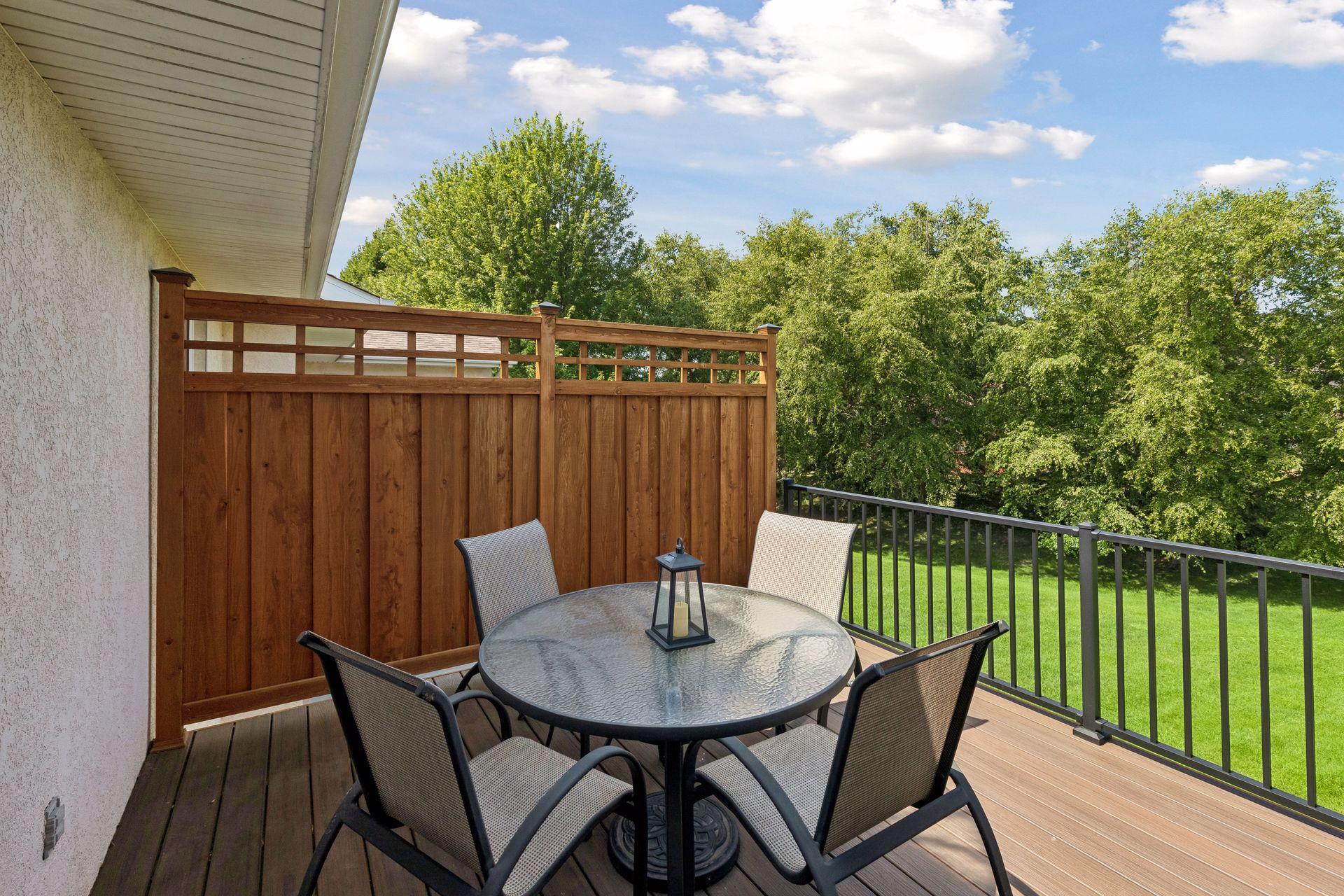 New maintenance-free decking and new railings overlooking yard.